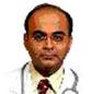 Dr. Neville Solomon