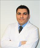 Profesor asociado Dr. Mehmet Emin Erdil