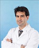 Profesor asociado Dr. Mesut Okur