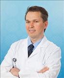 Profesor asociado Dr. Türkay Saritaş
